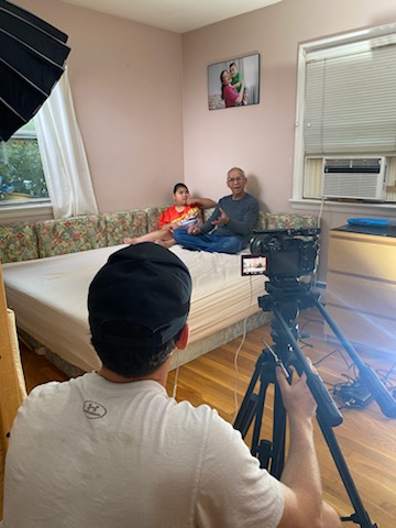 Nick Savino of NGS Productions conducting interviews and filming for the video.