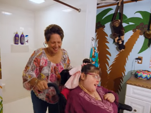 Mom can easily move with Katrina in the bath area.